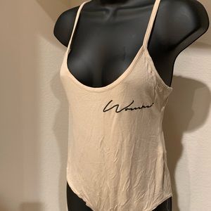 NWT “Woman” Bodysuit